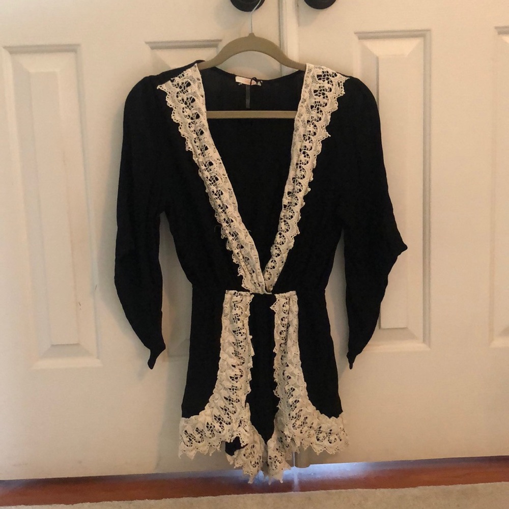 Black laced romper with elastic waistband